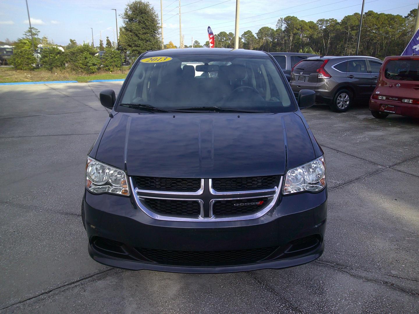 2013 GRAY DODGE GRAND CARAVAN SE (2C4RDGBG4DR) , located at 10405 Abercorn Street, Savannah, GA, 31419, (912) 921-8965, 31.988262, -81.131760 - Photo#0